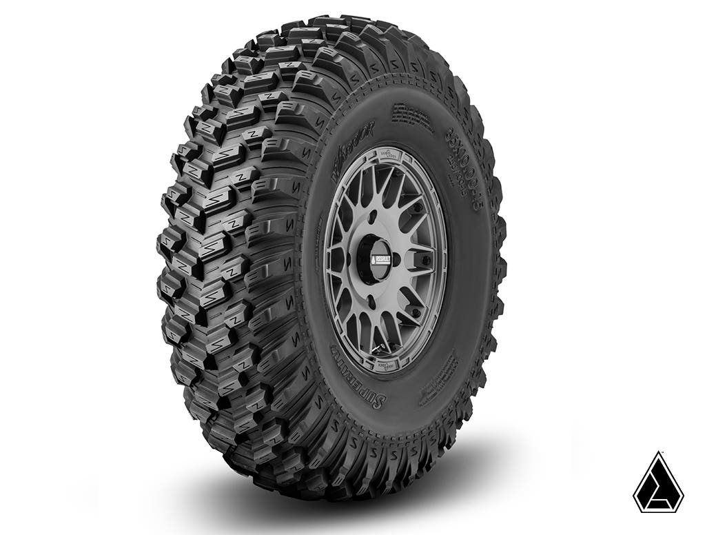 SuperATV Standard XT Warrior Tires 30x10x15 on 15x7 Assault Industries Hellfire Matte Titanium Wheels 4/136 Pattern